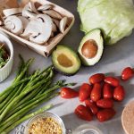 A fresh selection of vegetables and ingredients for preparing a nutritious meal.